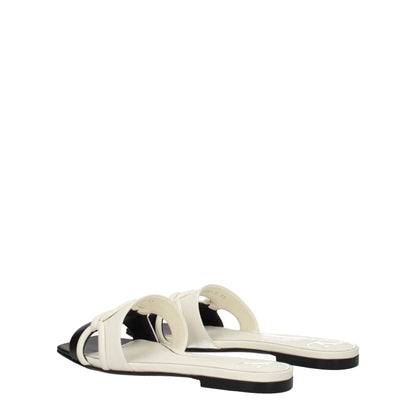 Valentino Garavani Slipper aus schwarzem Leder