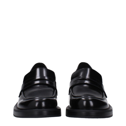 Stuart Weitzman Black Leather Slip-On Loafers