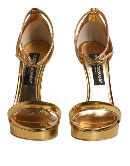 Dolce &amp; Gabbana Keira Sandalen aus goldenem Leder mit Plateausohle