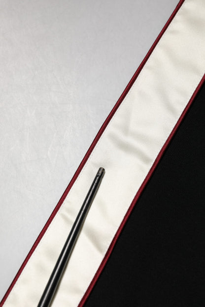 Dolce &amp; Gabbana – Schwarzer Cardigan-Pullover mit Baumwollplakette