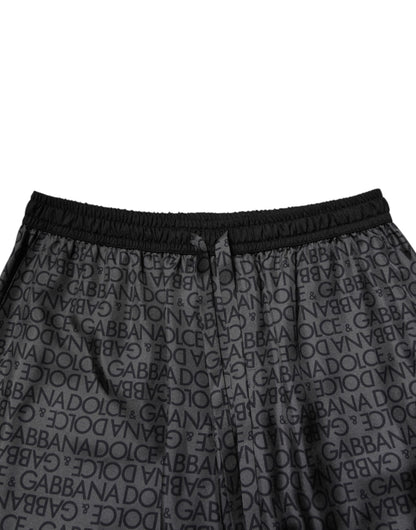 Dolce &amp; Gabbana Grau-schwarze Bermudashorts aus Seide mit DG-Logo für Herren
