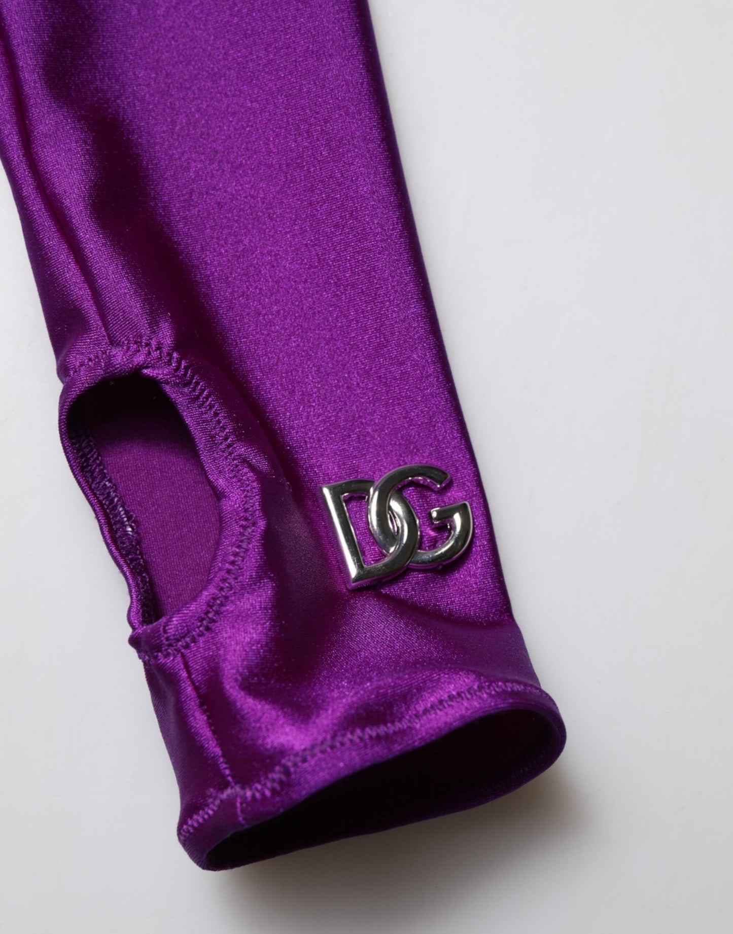 Dolce &amp; Gabbana, Lila, figurbetontes Jumpsuit-Kleid aus Nylon mit Rollkragen