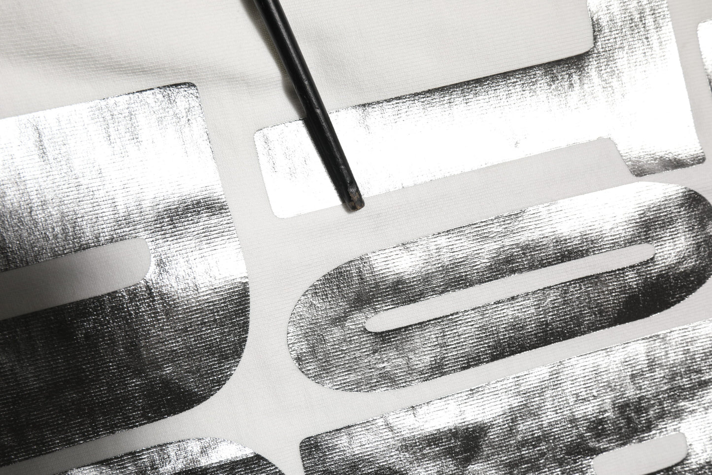 Dolce &amp; Gabbana – Weißes Baumwoll-T-Shirt mit Rundhalsausschnitt und Metallic-Print