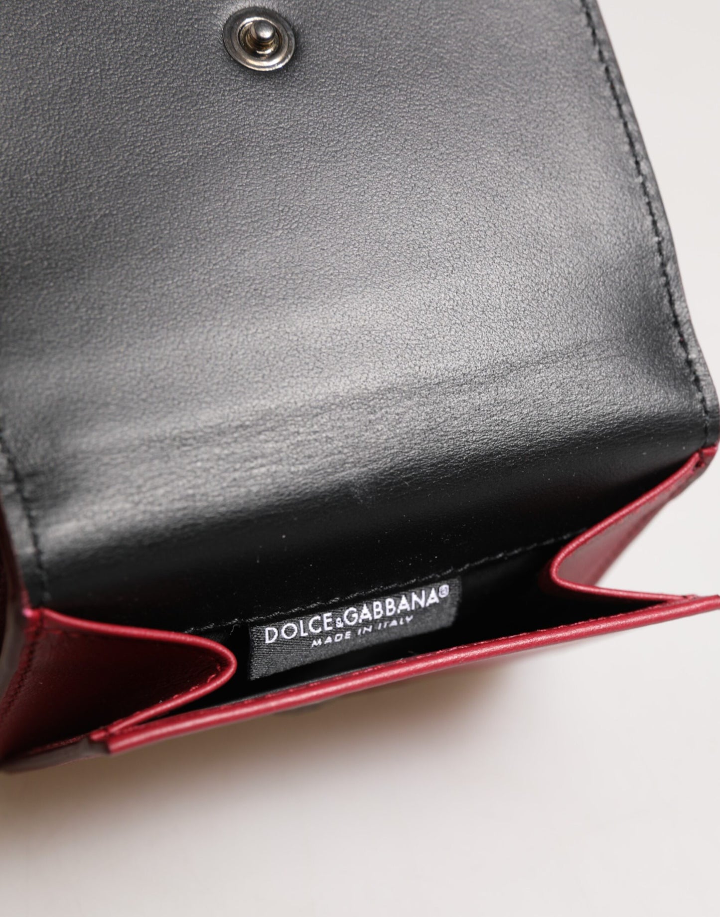 Dolce &amp; Gabbana – Dreifach faltbares Kartenetui aus rotem Leder mit auffälligem Logo-Print