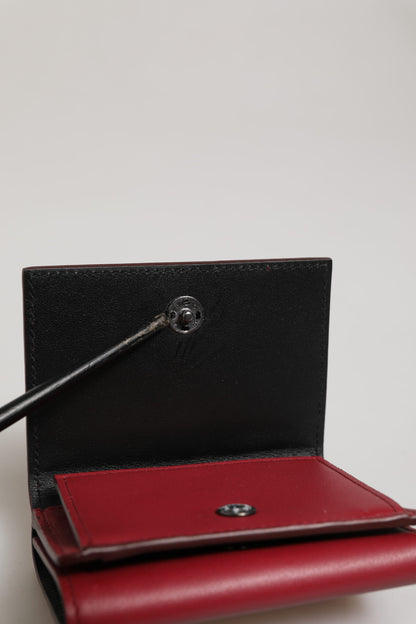 Dolce &amp; Gabbana – Dreifach gefaltete Herren-Kartenetui aus rotem Leder mit auffälligem Logo-Print