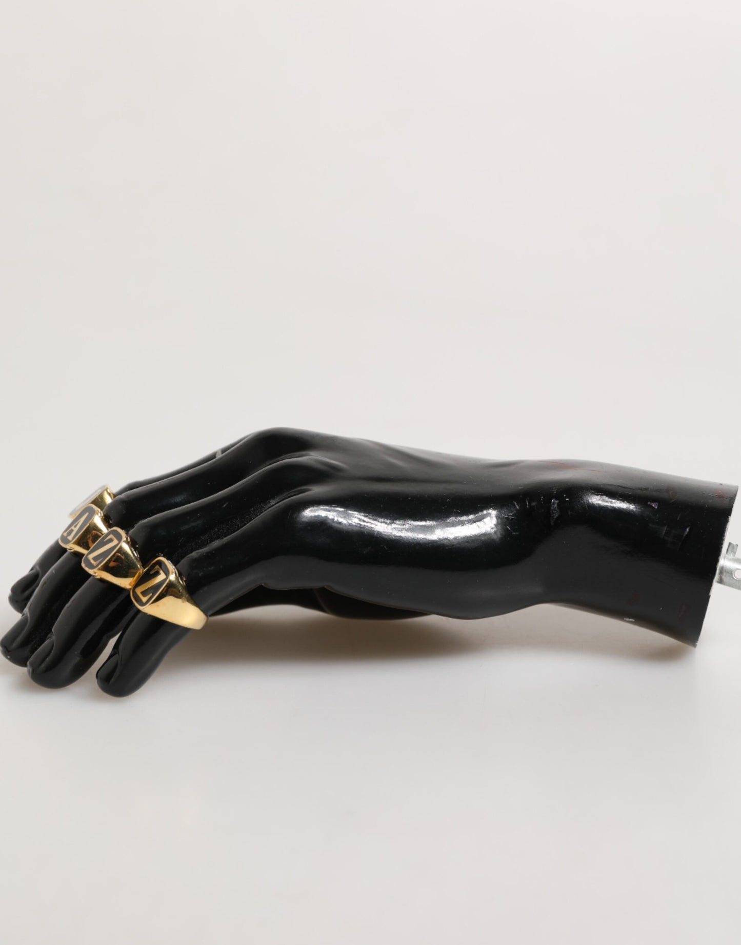 Dolce &amp; Gabbana – Goldfarbenes Messing-Buchstabenset „JAZZ“, 4-teilig, verstellbarer Ring