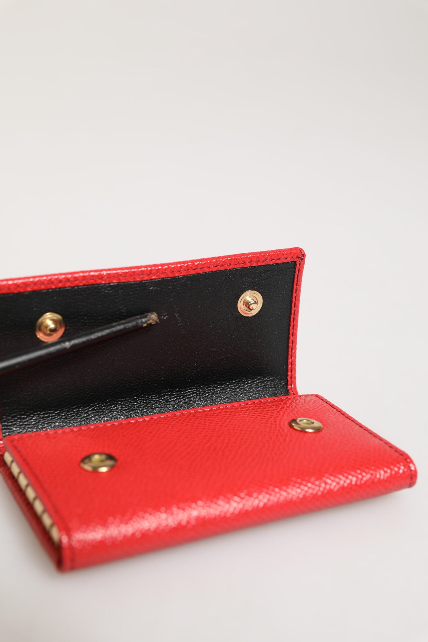 Dolce &amp; Gabbana – Dreifach faltbarer Schlüsselanhänger mit Logo-Plakette aus rotem Leder und silbernem Metall