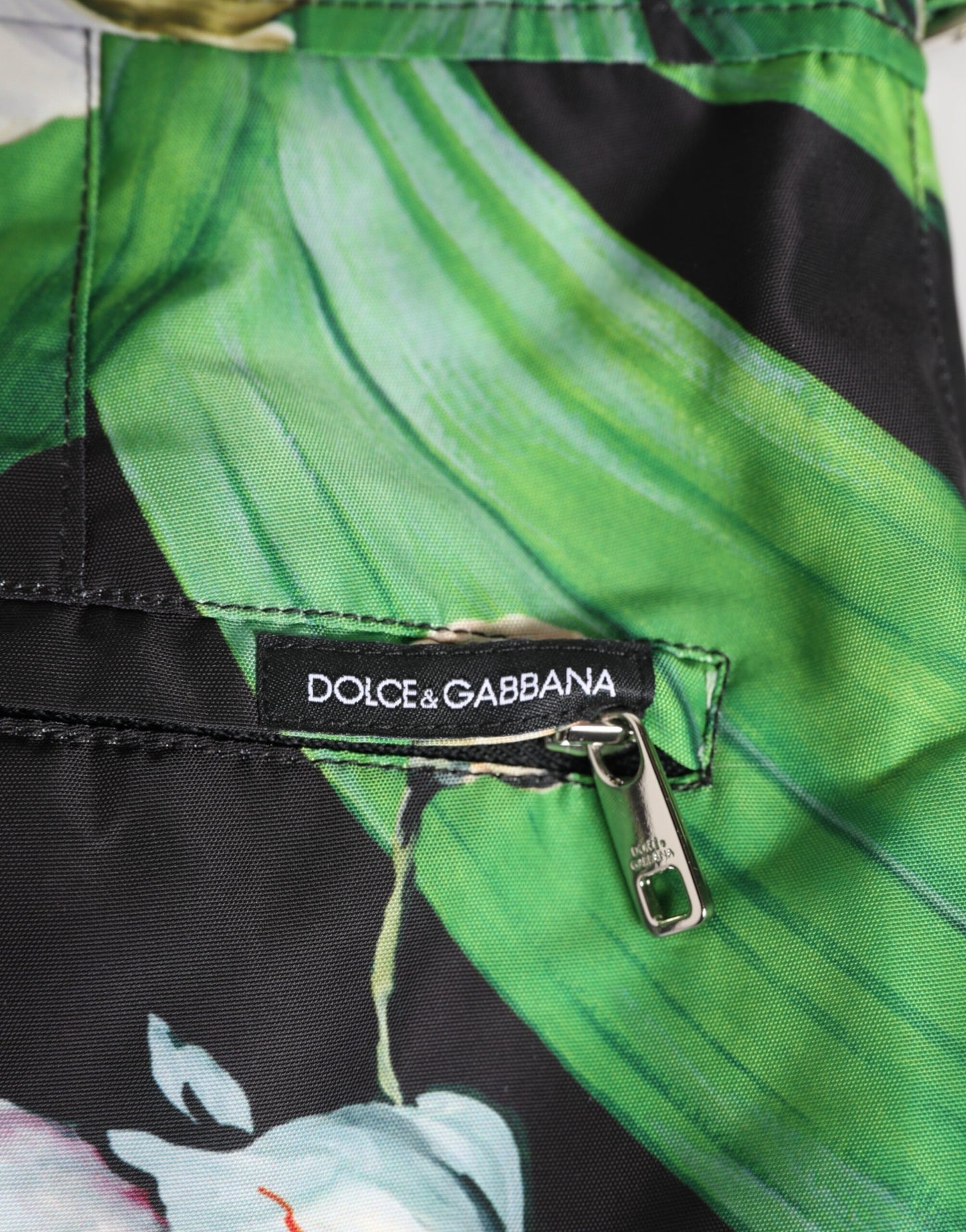 Dolce &amp; Gabbana – Shorts aus Polyester mit floralem Orchideen-Print in Schwarz und Weiß