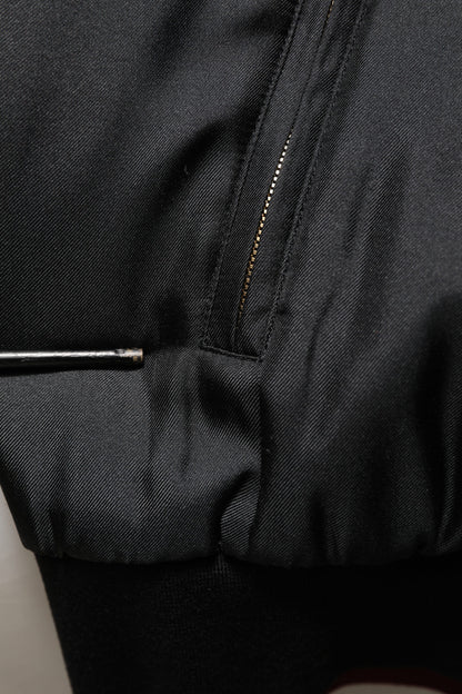 Dolce &amp; Gabbana – Bomber-Blousonjacke aus Seide mit Blumenmuster in Schwarz und Rot