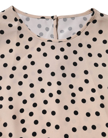Dolce &amp; Gabbana – Kurzärmliges Seidenblusenoberteil in Beige und Schwarz mit Punkten