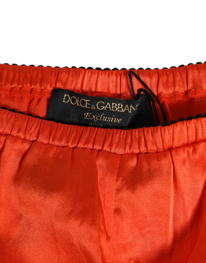 Dolce &amp; Gabbana Rote Shorts aus Seidensatin und Spitze
