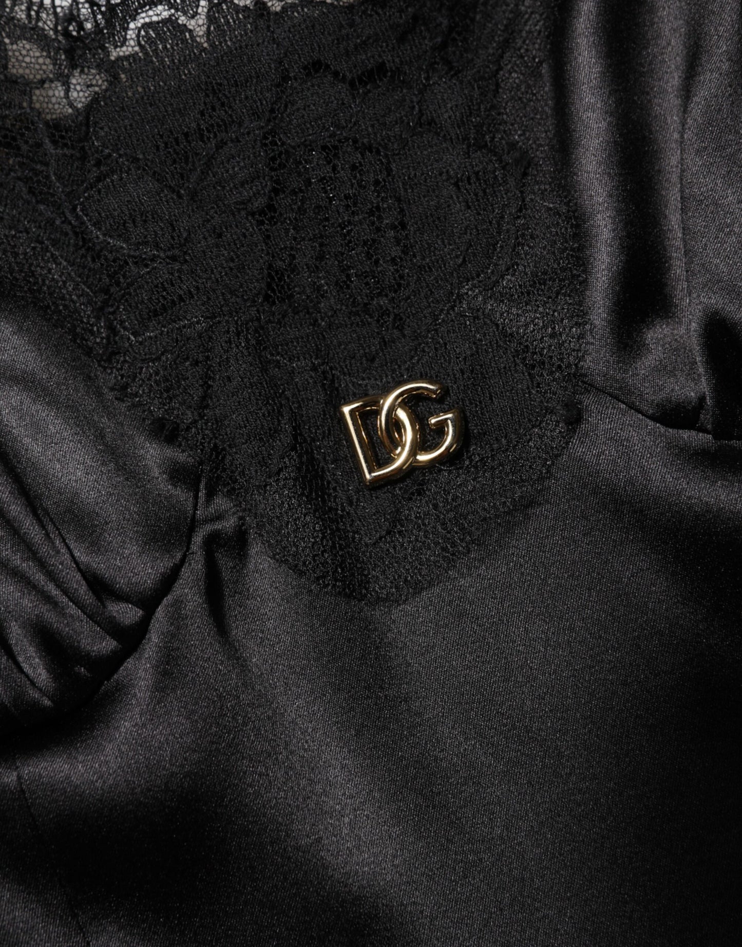 Dolce &amp; Gabbana Schwarzes ärmelloses Minikleid aus Seidenmischung mit Spitzenbesatz