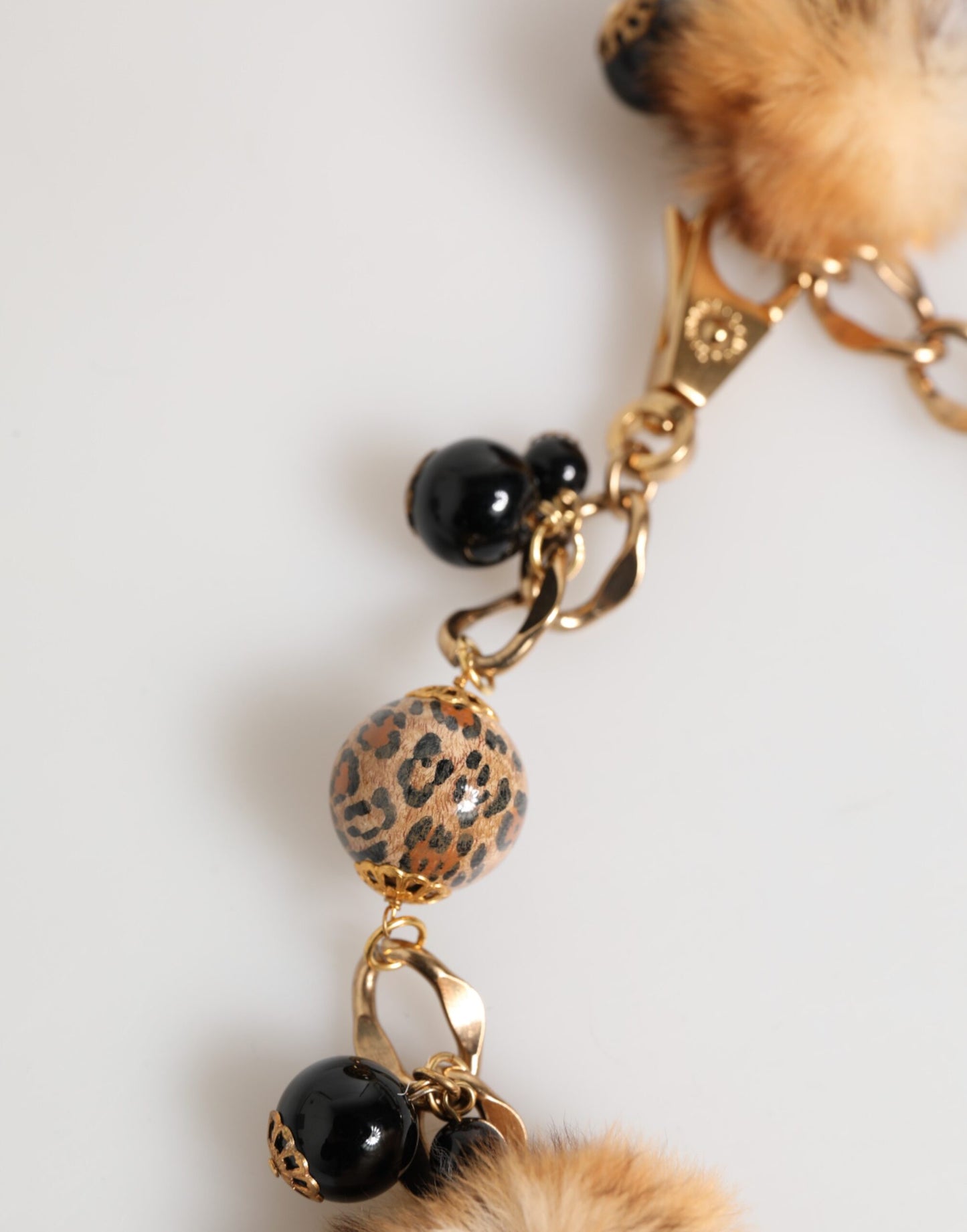 Dolce &amp; Gabbana – Filigrane Halskette aus Lapin-Fell in Gold und Schwarz mit Kristallen