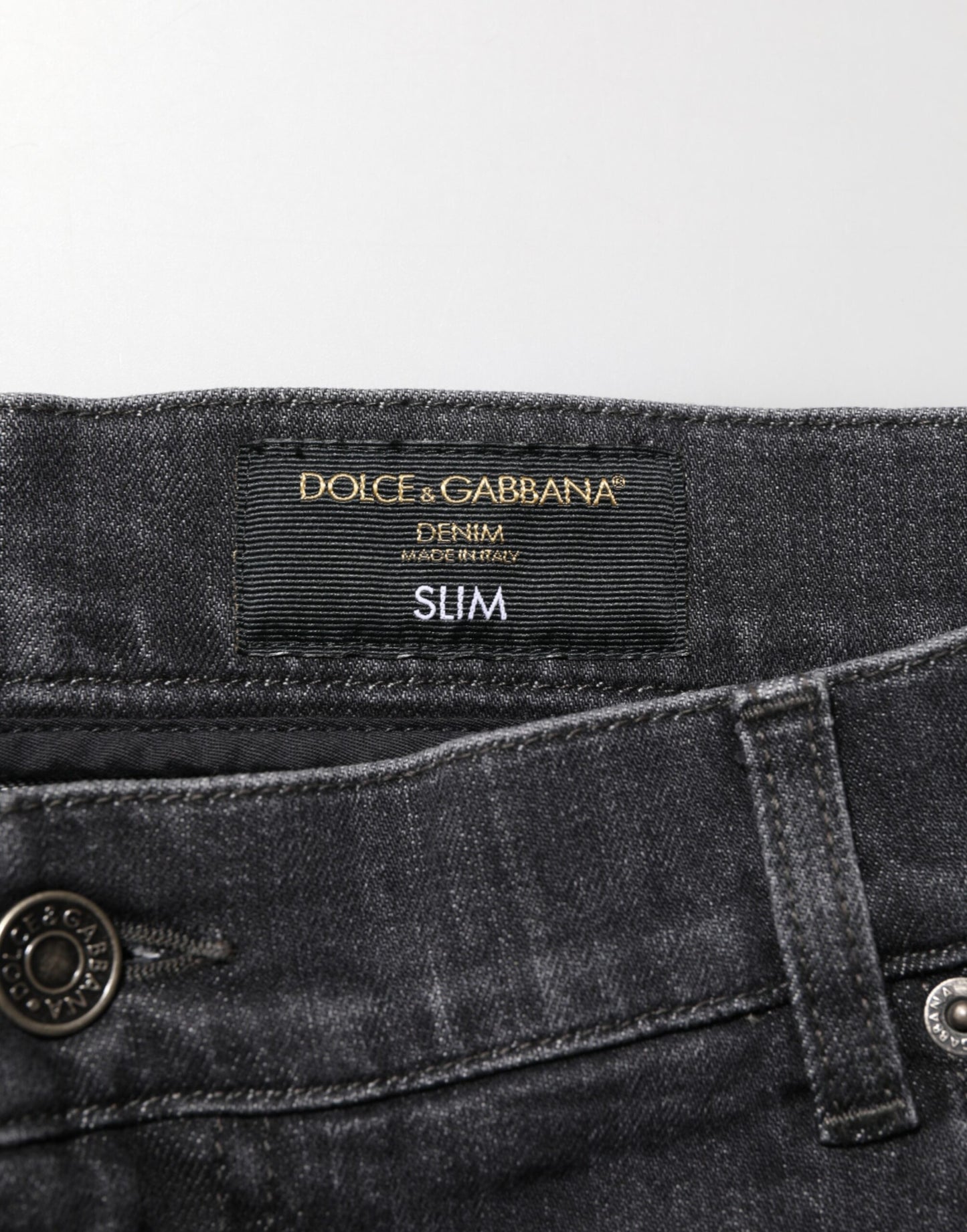 Dolce &amp; Gabbana – Slim Fit-Jeans aus schwarzer Baumwolle mit zerrissenem Logo