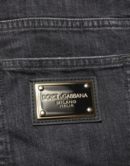 Dolce &amp; Gabbana – Slim Fit-Jeans aus schwarzer Baumwolle mit zerrissenem Logo