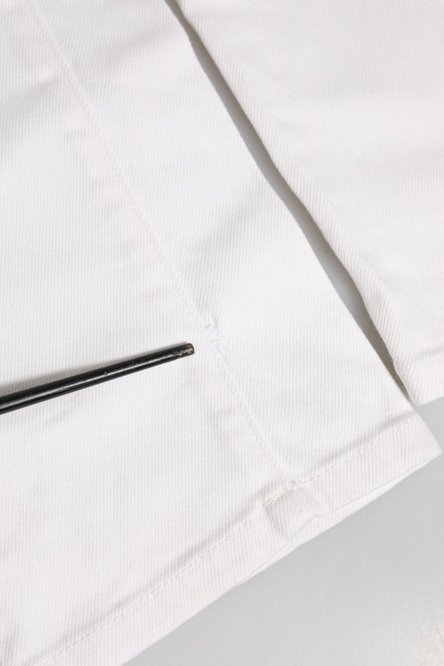 Dolce &amp; Gabbana Slim Fit Jeans aus Stretch-Baumwolle in Off-White