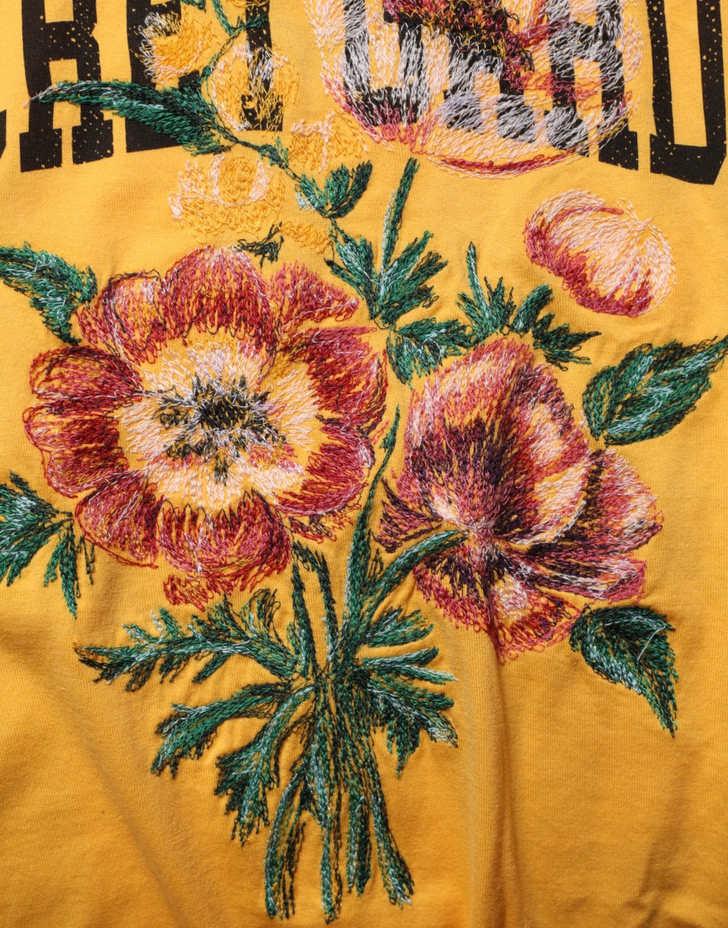 Dolce &amp; Gabbana Gelbes T-Shirt aus Baumwolle mit Rundhalsausschnitt und Blumenmuster „Secret Graden“