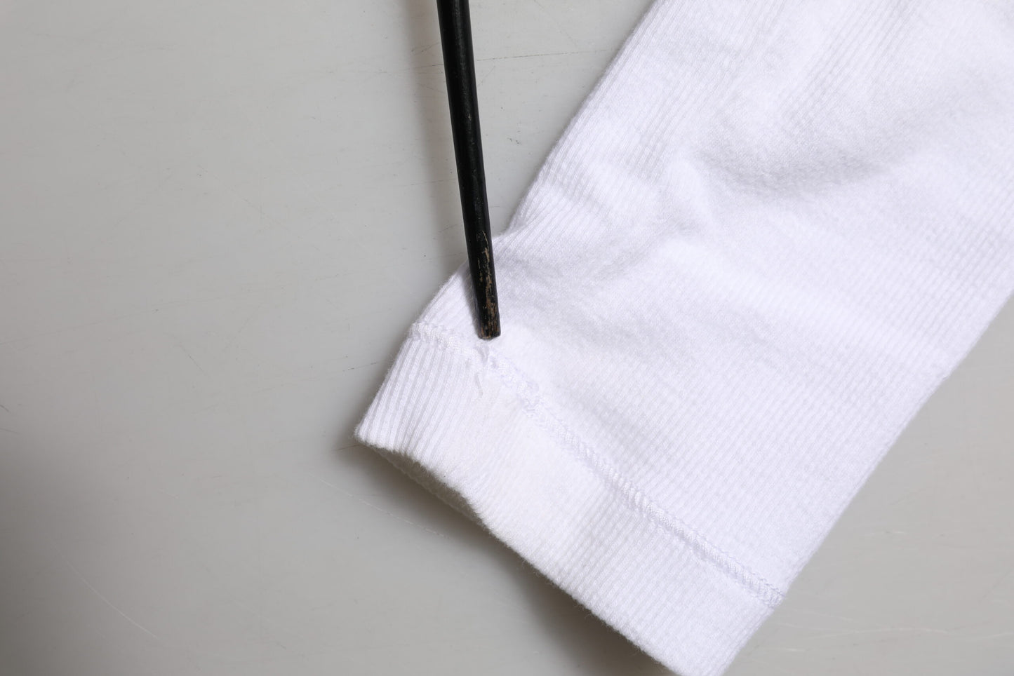 Dolce &amp; Gabbana – Weißes, langärmliges T-Shirt mit Knopfverschluss