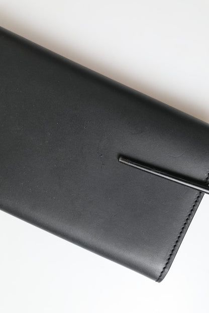 Dolce &amp; Gabbana – Kleine, zweifach gefaltete Geldbörse aus schwarzem Leder mit Logoprägung