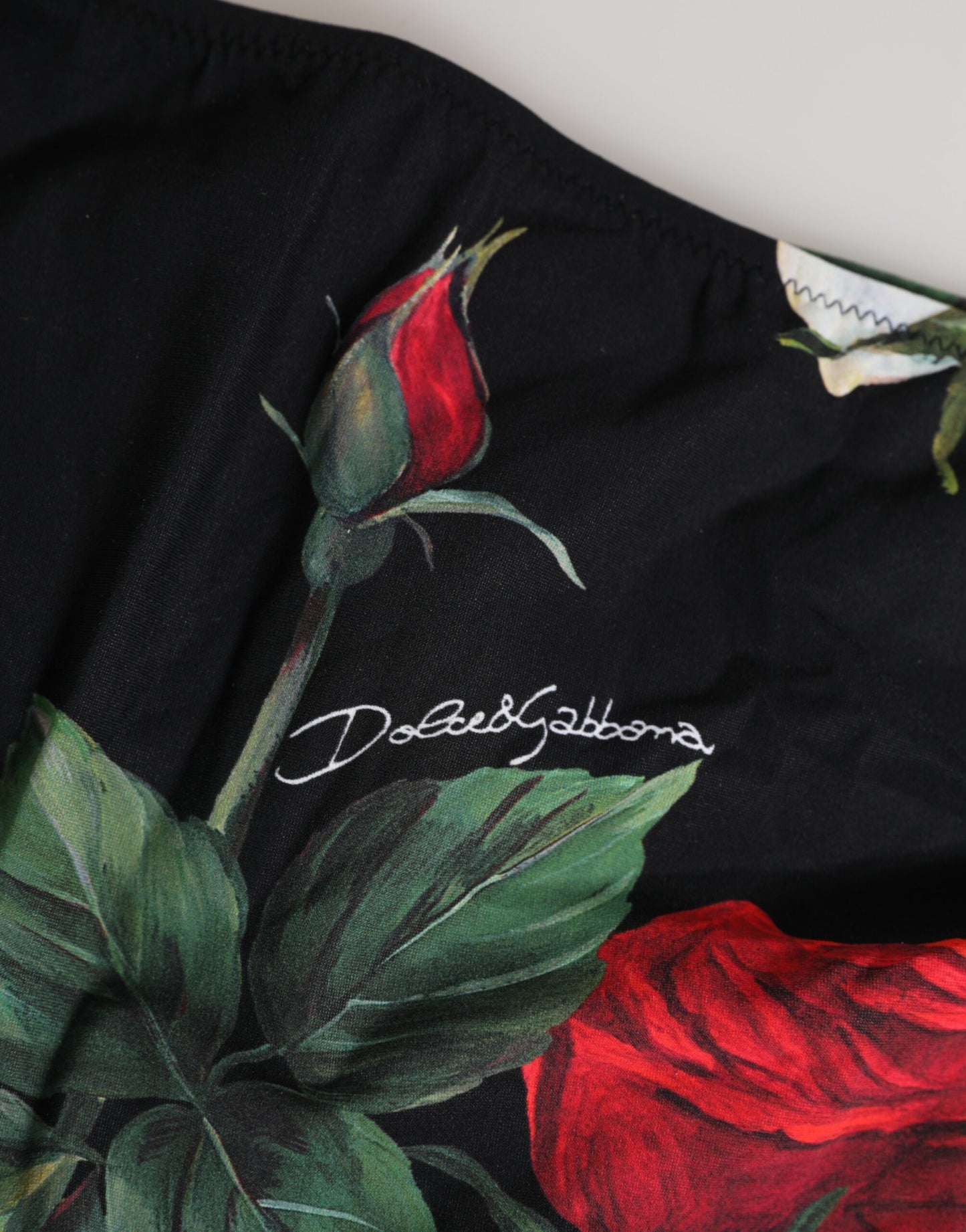 Dolce &amp; Gabbana – Schwarze Bikinihose mit seitlicher Schnürung und Blumenmuster