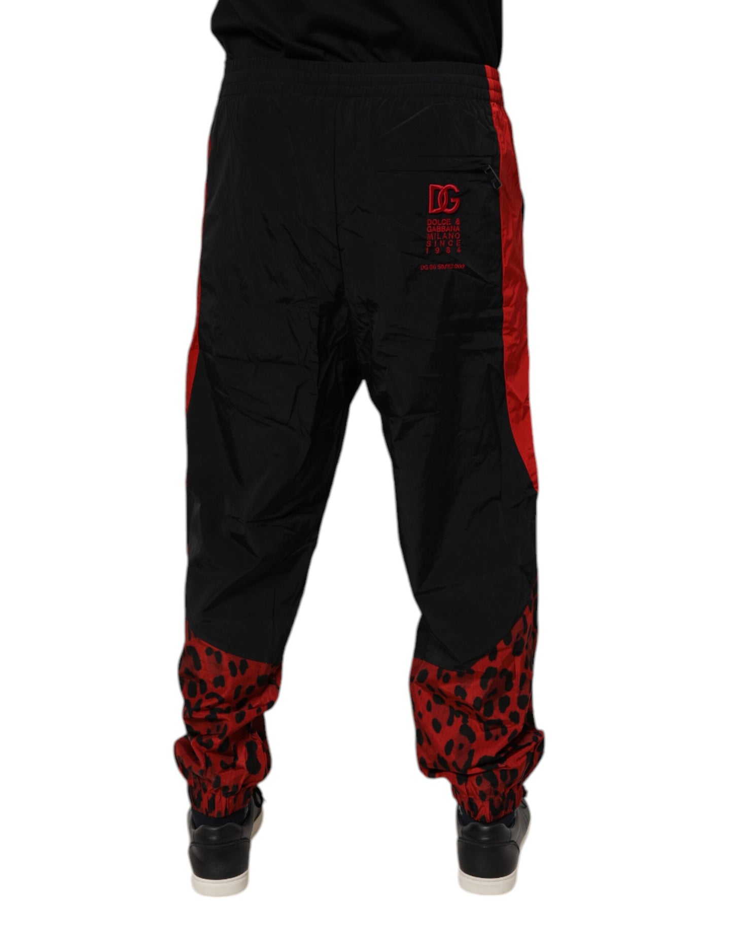 Dolce &amp; Gabbana – Jogginghose aus Nylon mit Leopardenmuster in Schwarz und Rot