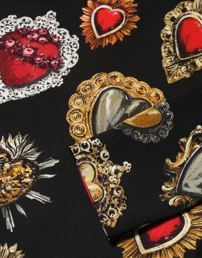 Dolce &amp; Gabbana – Schwarzes, langärmliges Oberteil mit Herz-Jesu-Print