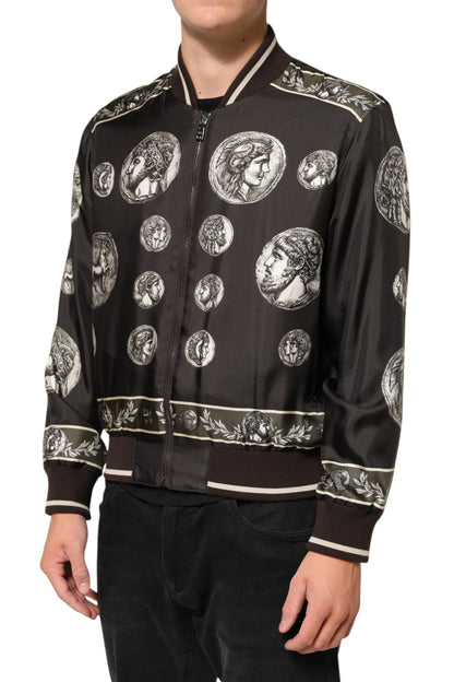 Dolce &amp; Gabbana – Schwarze Bomberjacke aus Seide mit „Monete“-Münzdruck