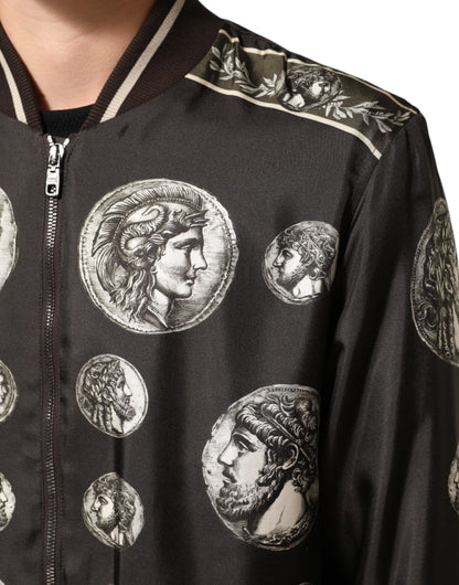 Dolce &amp; Gabbana – Schwarze Bomberjacke aus Seide mit „Monete“-Münzdruck