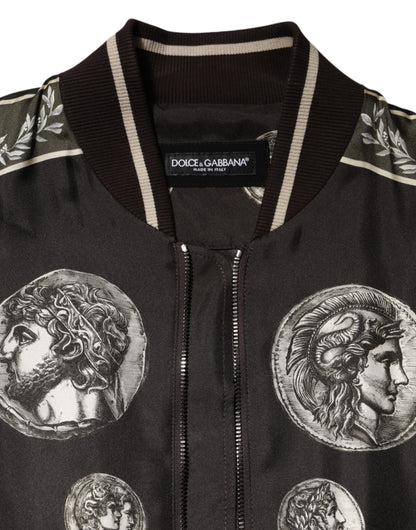 Dolce &amp; Gabbana – Schwarze Bomberjacke aus Seide mit „Monete“-Münzdruck