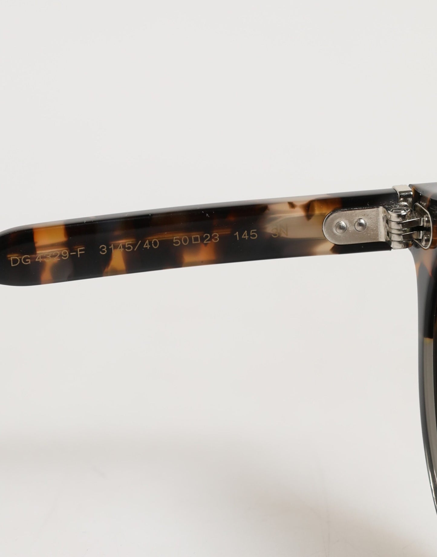 Dolce &amp; Gabbana DG4334B Sonnenbrille mit rundem Rahmen in Braun mit Schildpatt-Optik