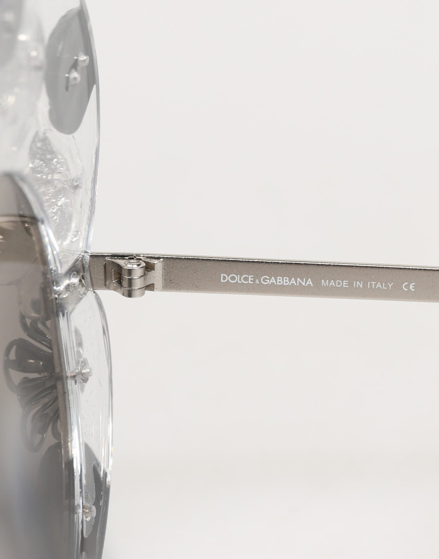 Dolce &amp; Gabbana Transparente Sonnenbrille DG4292 mit runden Kristallblumen