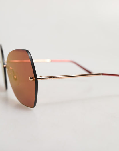 Dolce &amp; Gabbana – Lucia – Cat-Eye-Sonnenbrille aus goldenem Metall mit roten Gläsern