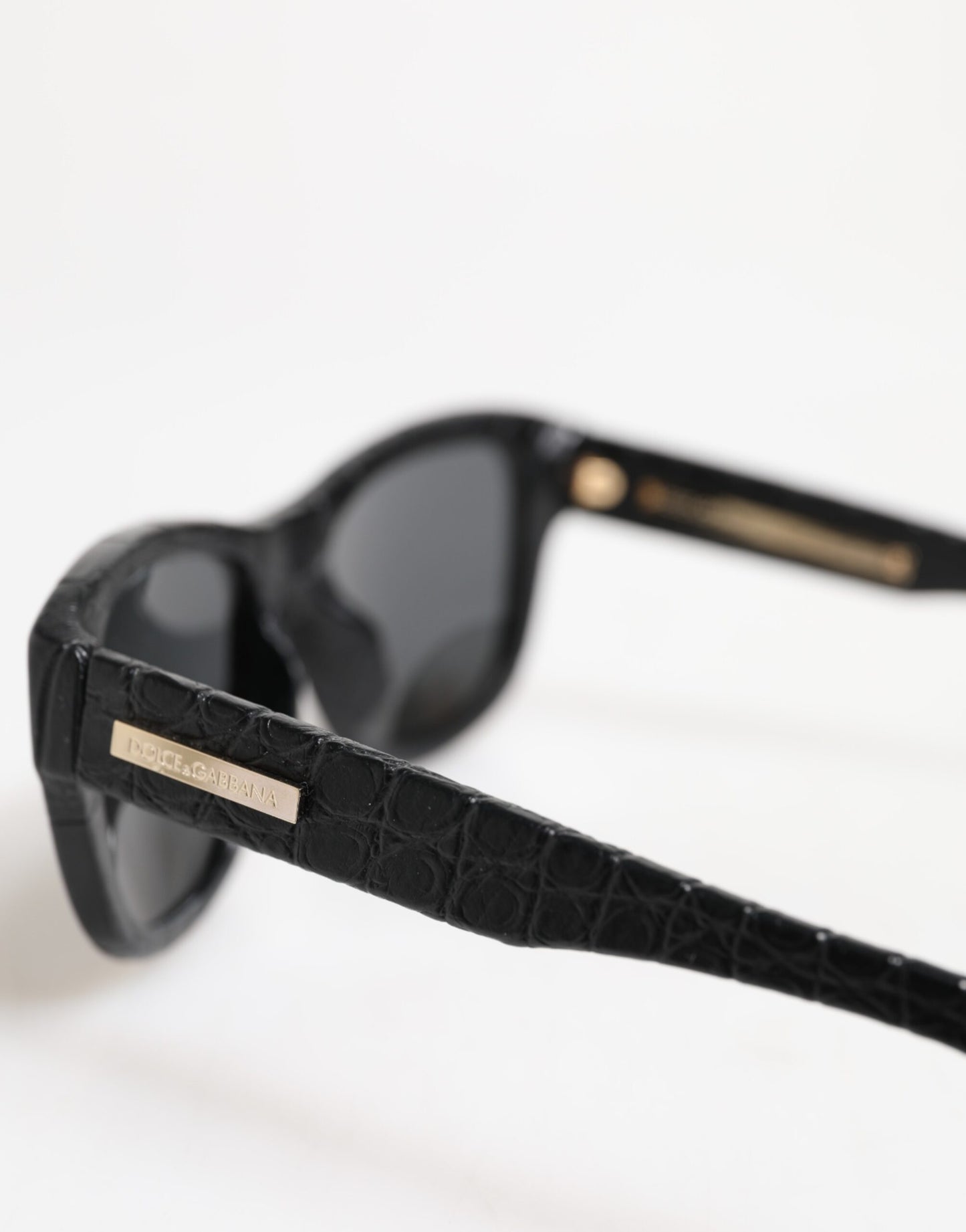 Dolce &amp; Gabbana DG4177 – Sonnenbrille mit getönten Gläsern und schwarzem Lederrahmen